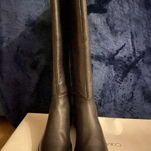 Black Calvin Klein tall boots